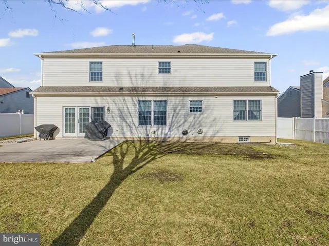 a view of a house with swimming pool