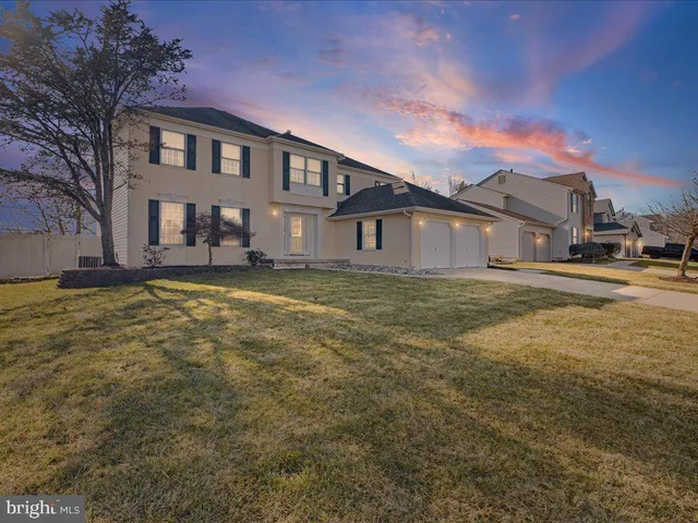 a view of a yard in front of a house