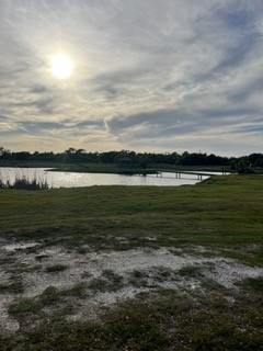 130 McPherson Road Rockport, TX 78382 - Photo 9 of 10 View of neighboring private lake from backside of