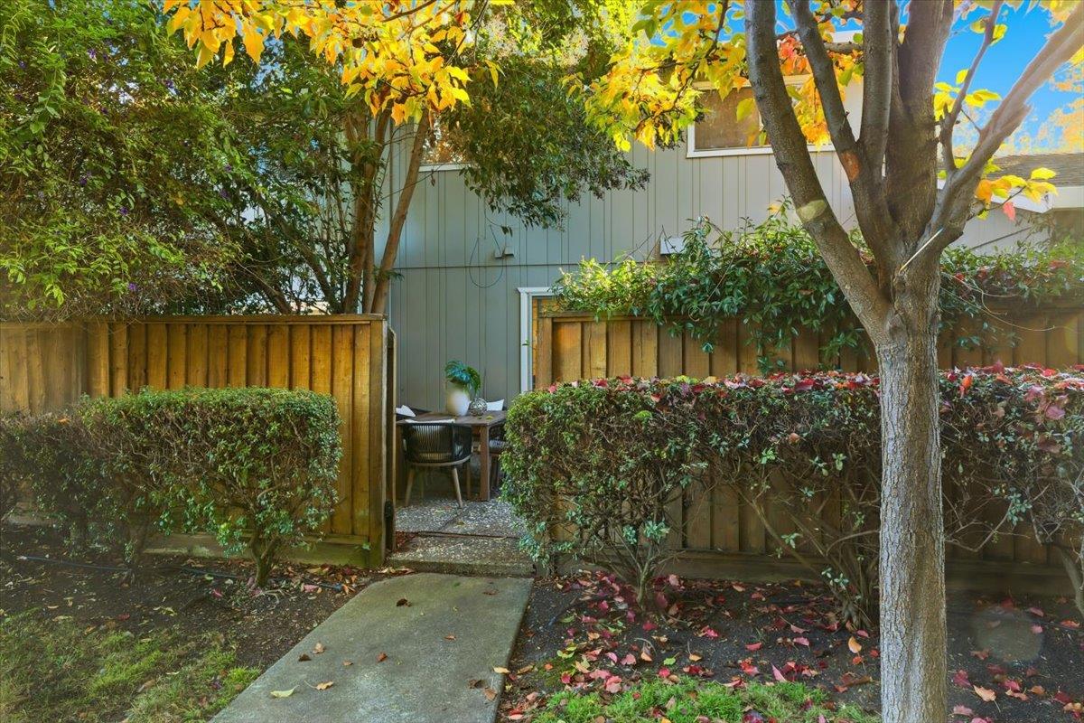 1542 Canna Court Mountain View, CA 94043 - Photo 29 of 34 a view of a garden with a lake