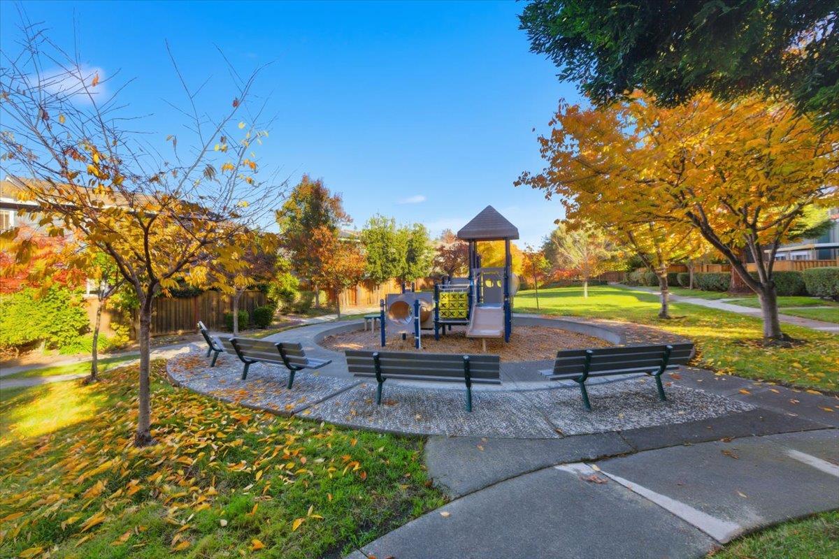 1542 Canna Court Mountain View, CA 94043 - Photo 31 of 34 a park bench sitting in the middle of a park