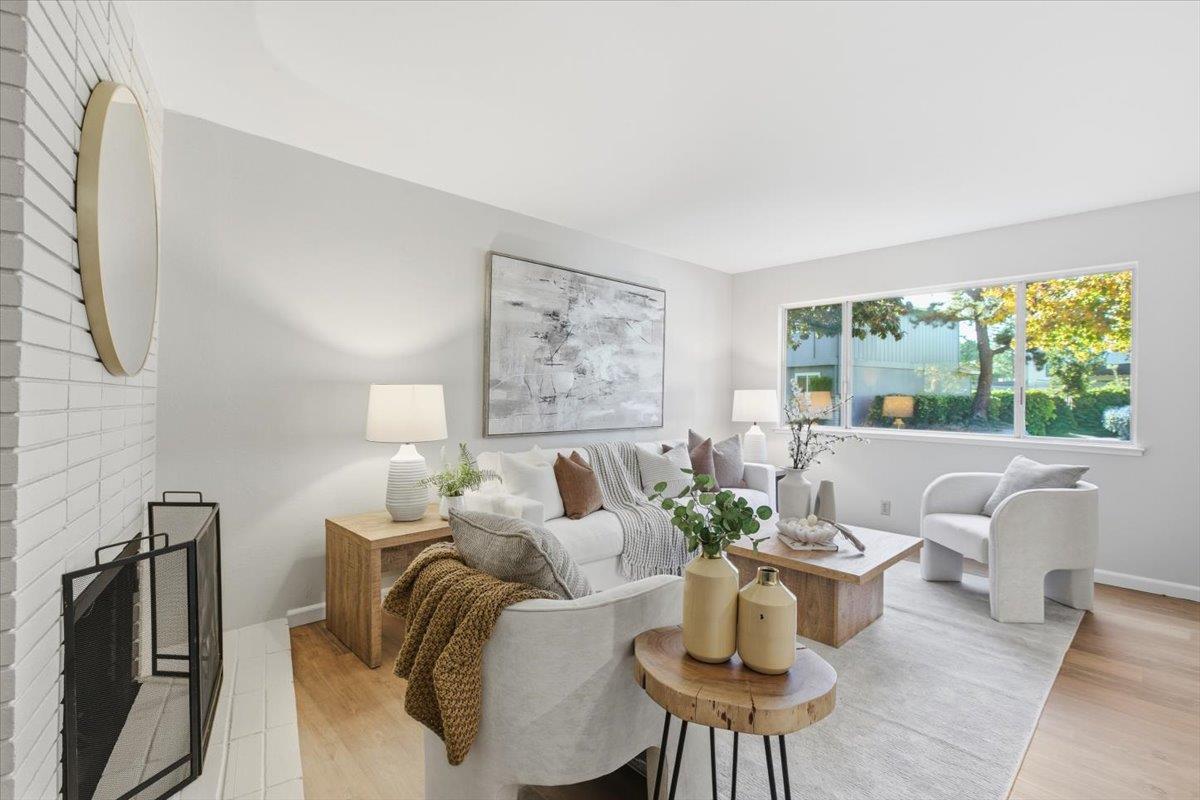 1542 Canna Court Mountain View, CA 94043 - Photo 4 of 34 a living room with furniture and a large window