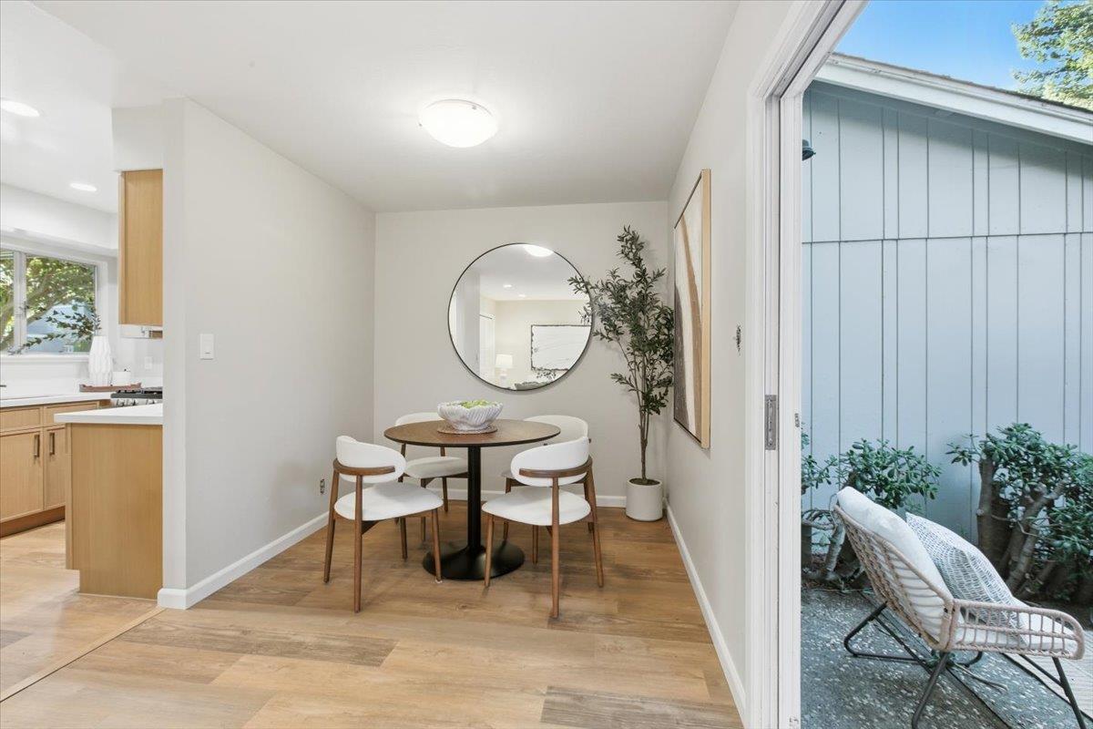 1542 Canna Court Mountain View, CA 94043 - Photo 8 of 34 a view of a dining room with furniture and wooden floor