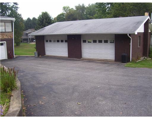 608 Butler Road Kittanning, PA 16201 - Photo 2 of 9 Exterior Front. Huge garage with another garage underneath