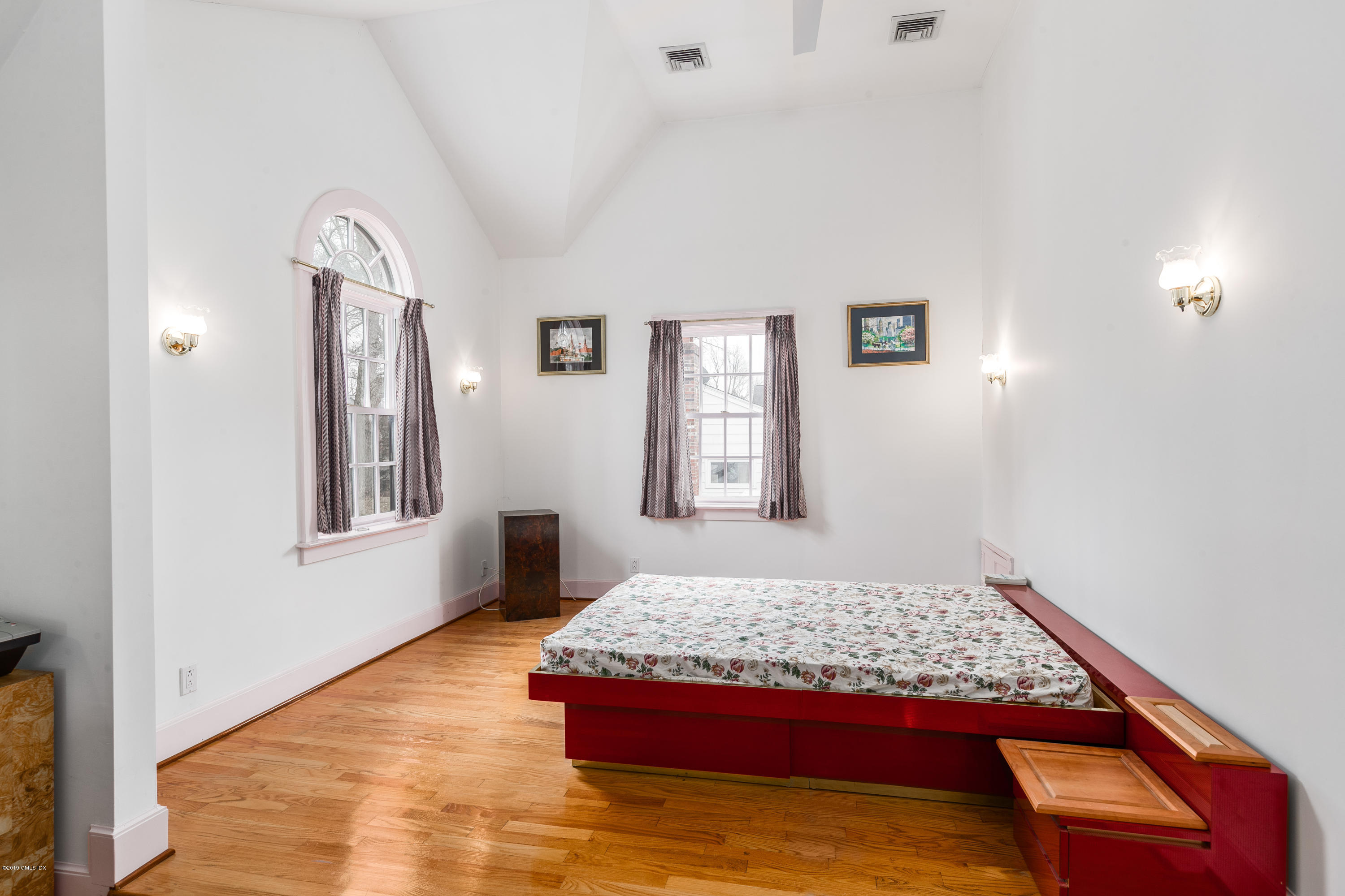 25 Oval Avenue Riverside, CT 06878 - Photo 14 of 18 a bedroom with a large bed and a window