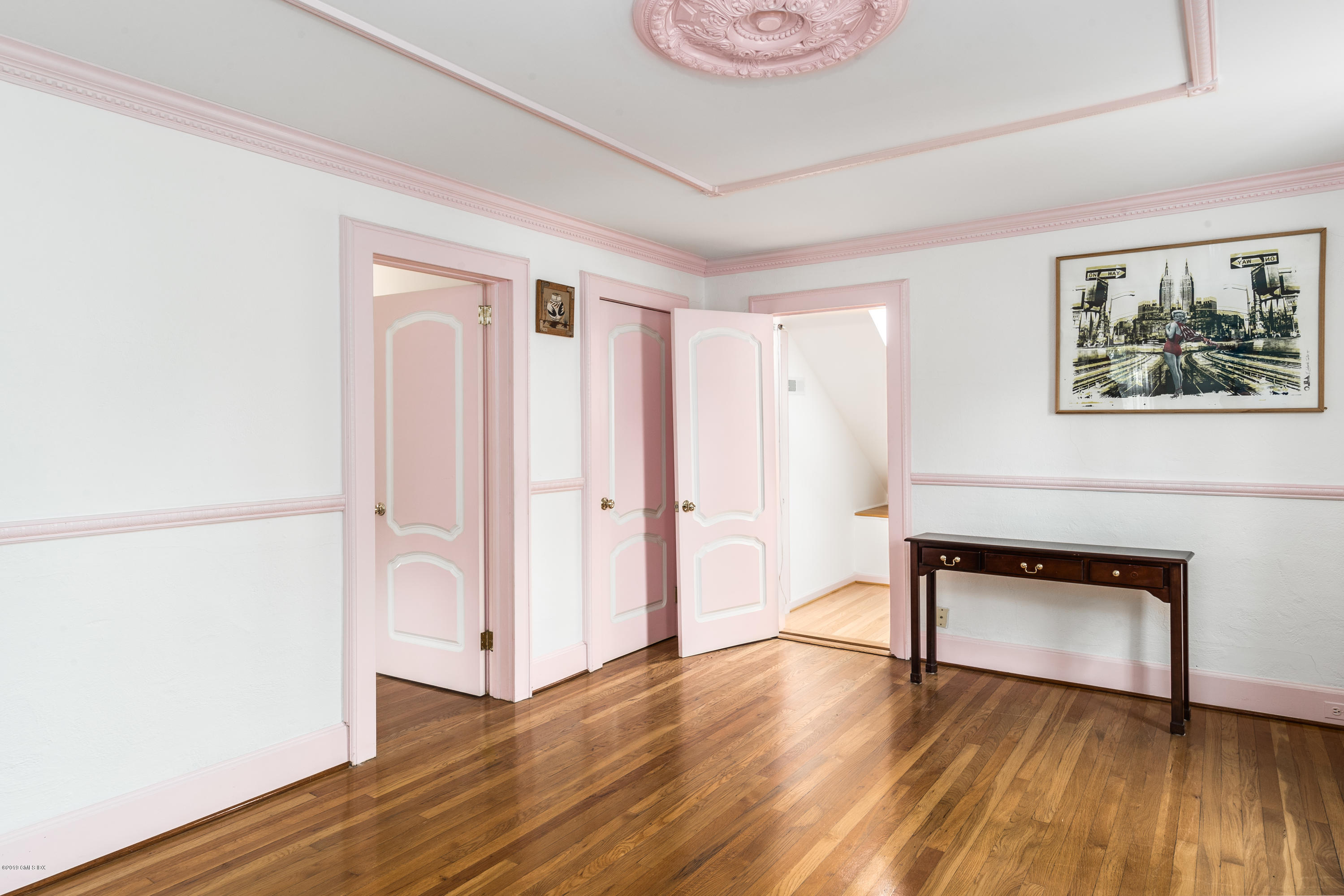 25 Oval Avenue Riverside, CT 06878 - Photo 15 of 18 a view of an empty room with wooden floor and a window
