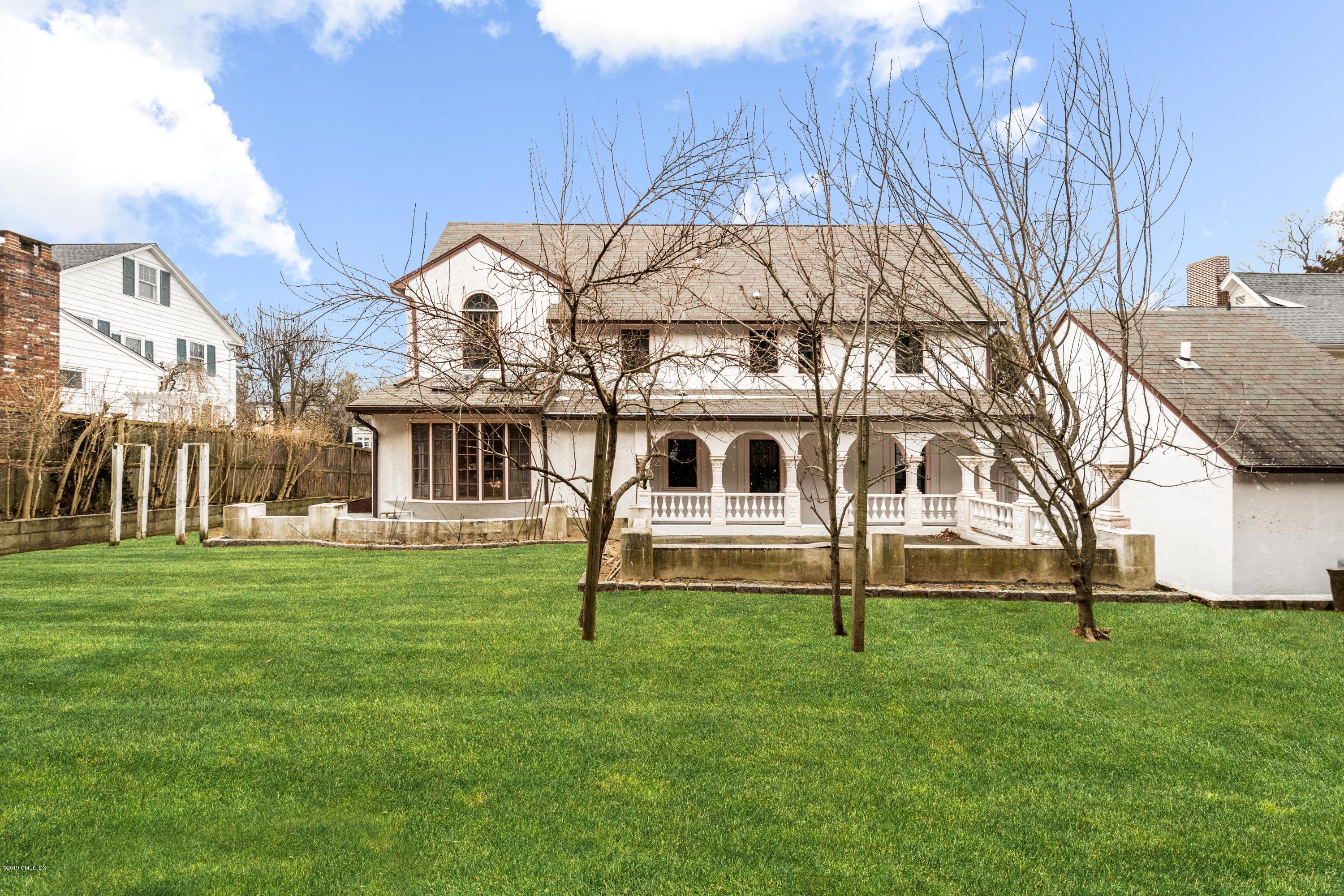 25 Oval Avenue Riverside, CT 06878 - Photo 18 of 18 a view of a house with a backyard