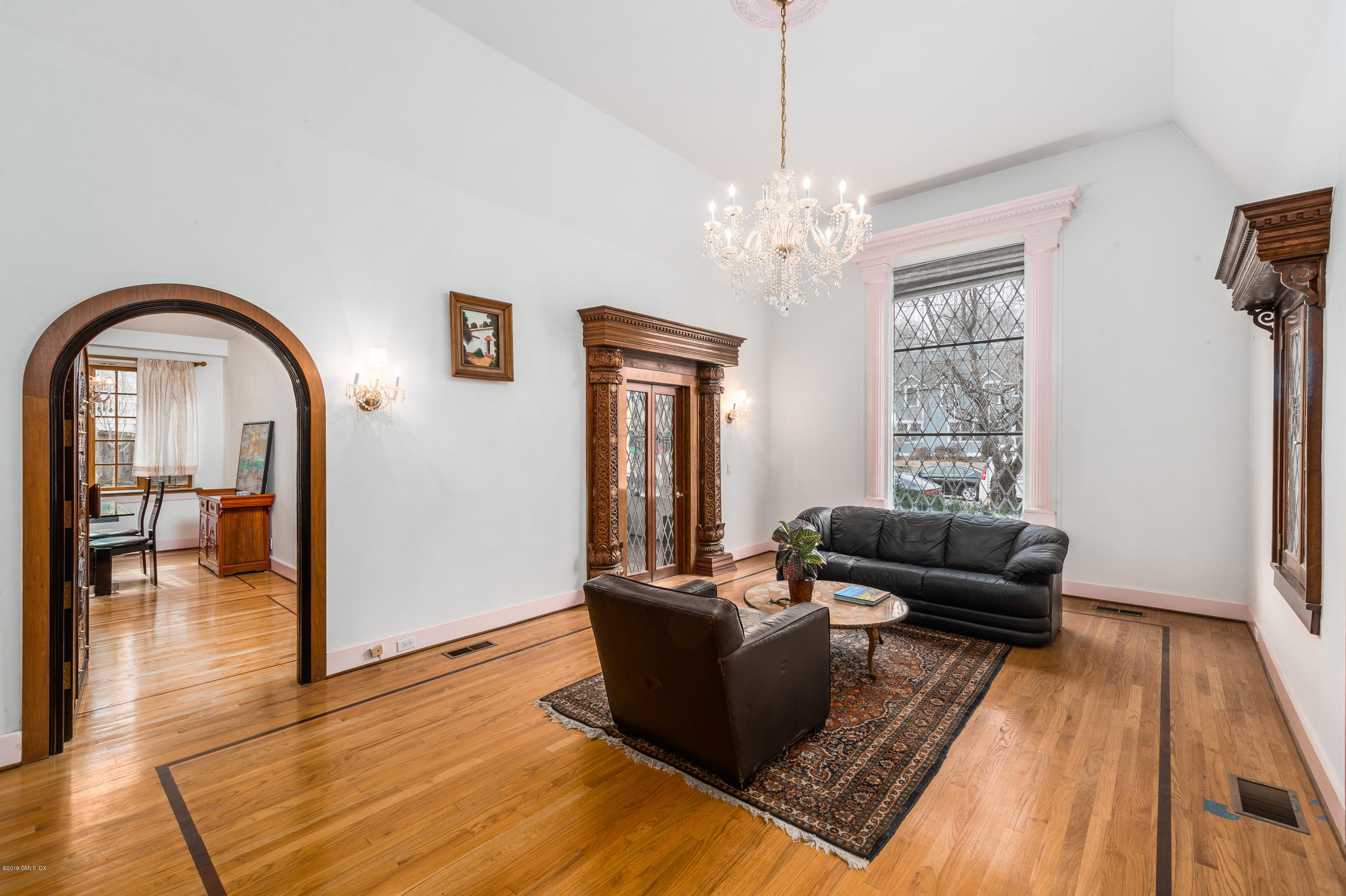 25 Oval Avenue Riverside, CT 06878 - Photo 2 of 18 a living room with furniture and wooden floor