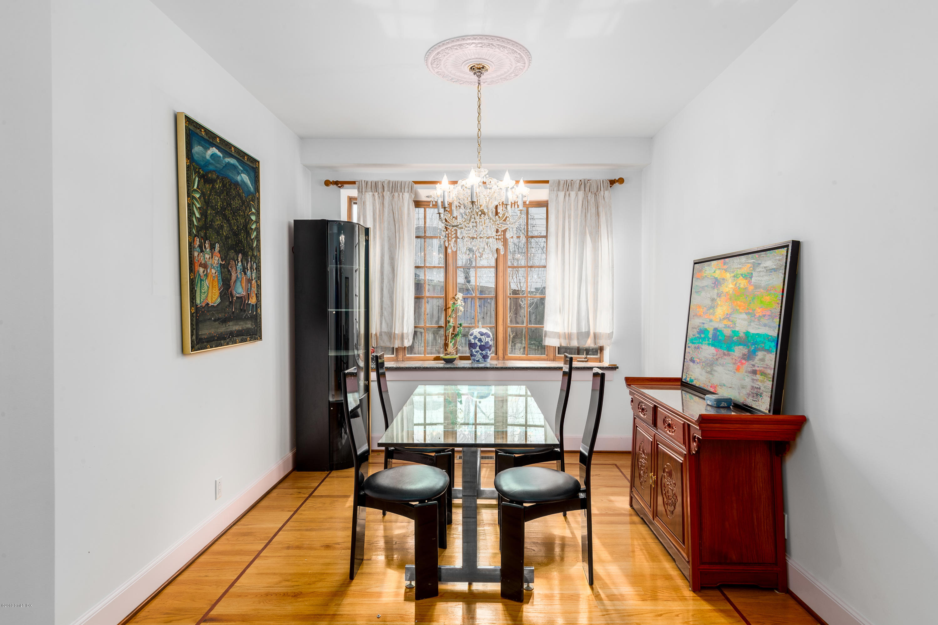 25 Oval Avenue Riverside, CT 06878 - Photo 5 of 18 a view of a dining room with furniture window and outside view
