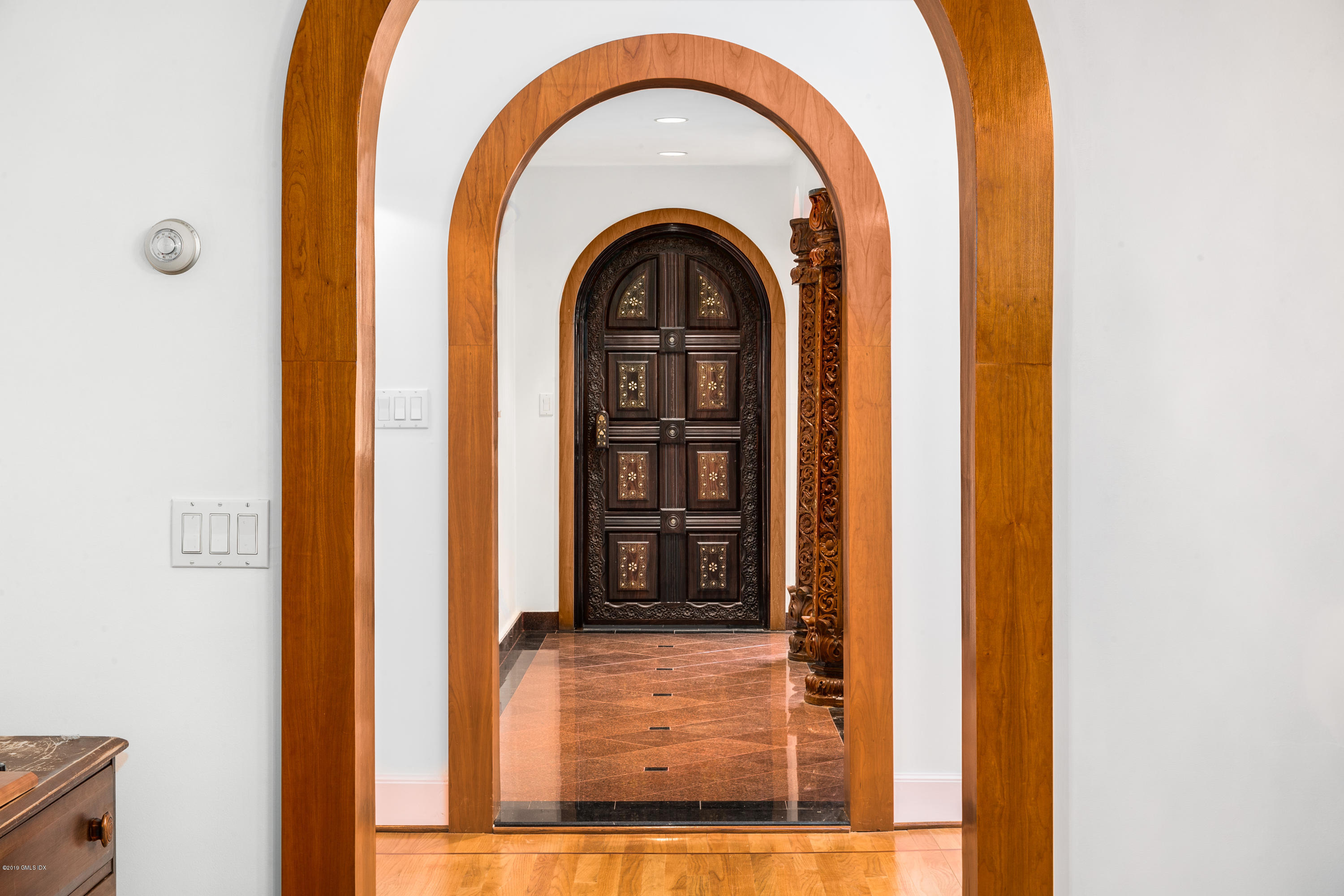 25 Oval Avenue Riverside, CT 06878 - Photo 9 of 18 a view of a entryway door of the house