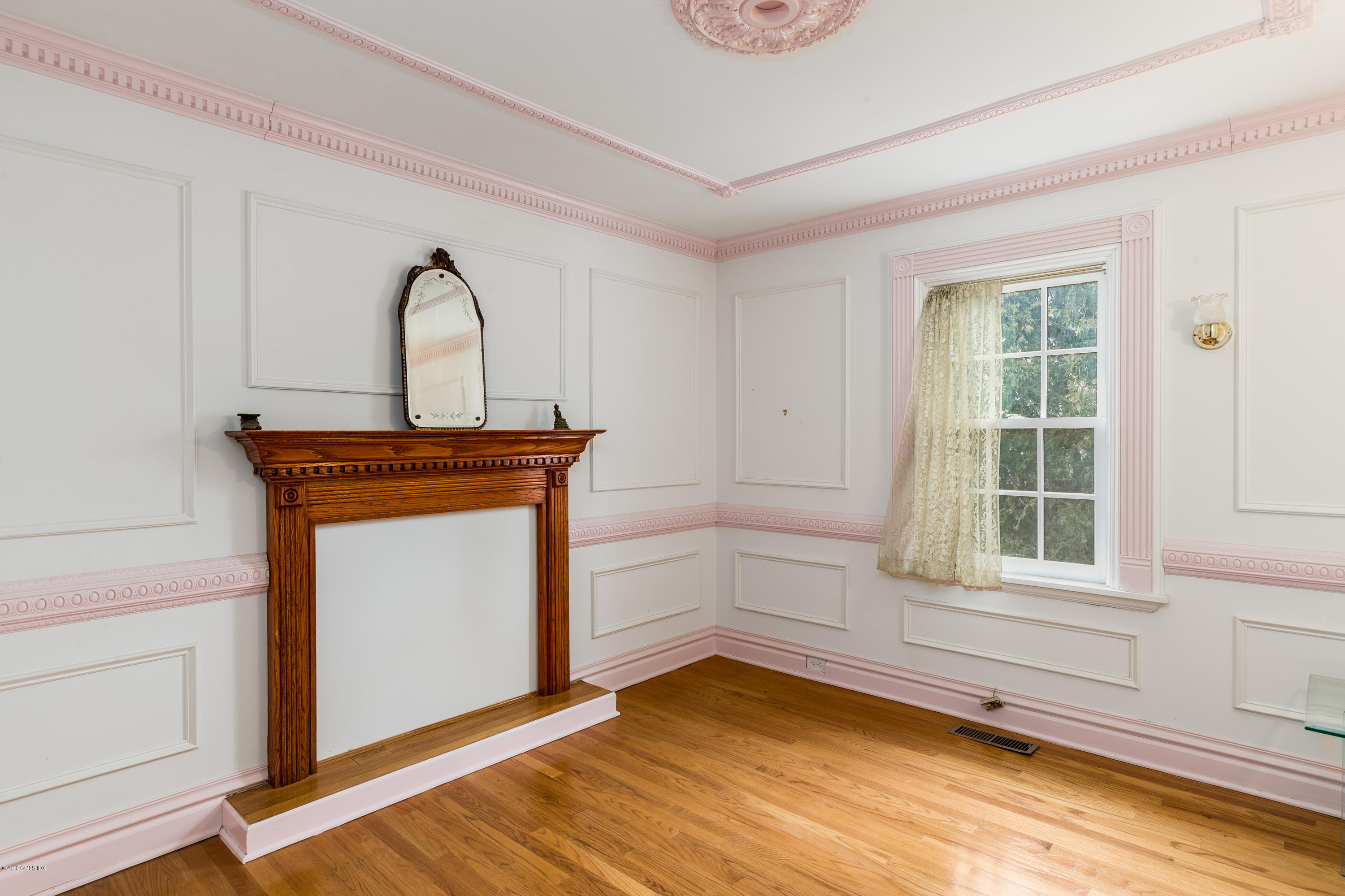 25 Oval Avenue Riverside, CT 06878 - Photo 10 of 18 a view of a room with wooden floor and cabinet