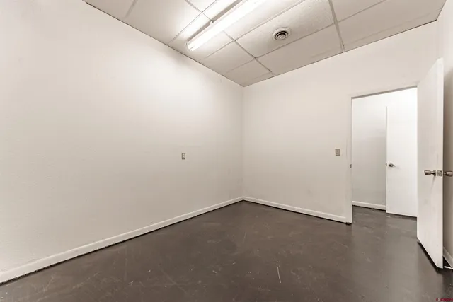 a view of a workspace with furniture