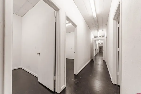 an empty room with a bench