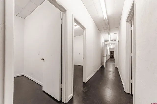 an empty room with a bench