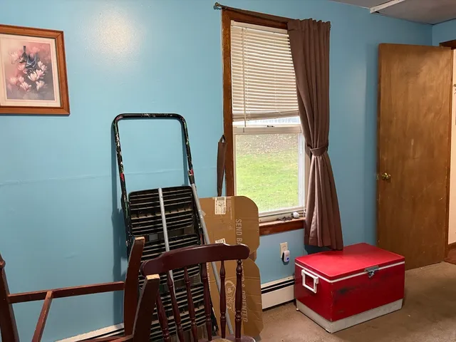 a room with furniture and window