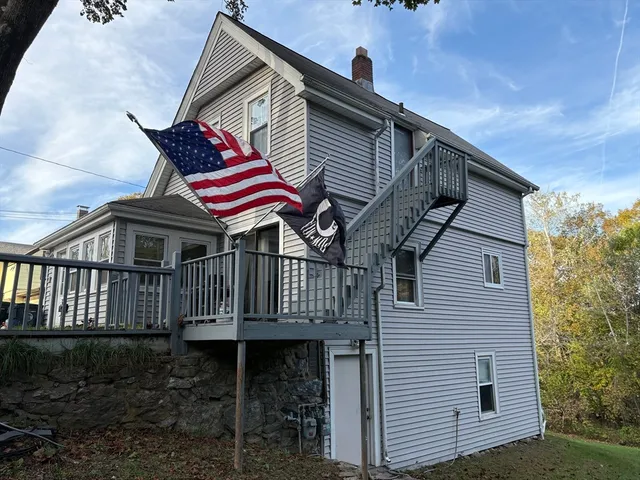 a front view of a house with a porch
