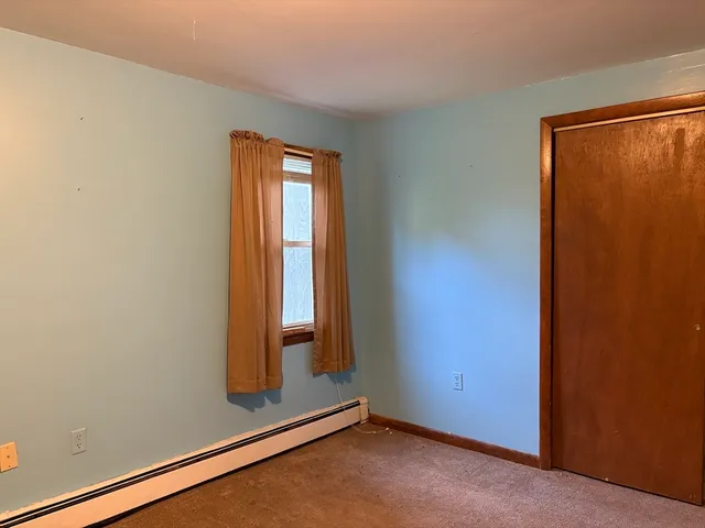 an empty room with window