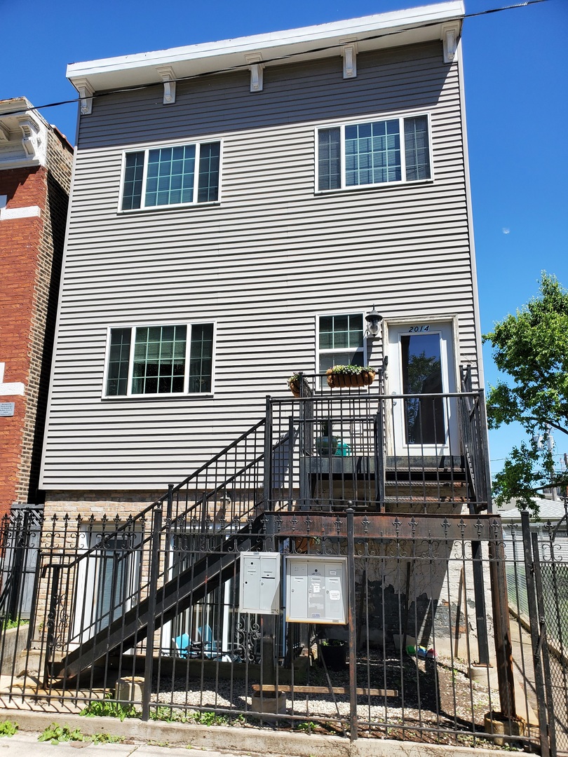 2014 West Superior Street, Unit 2 Chicago, IL 60612 - Photo 1 of 11 a view of a house with street