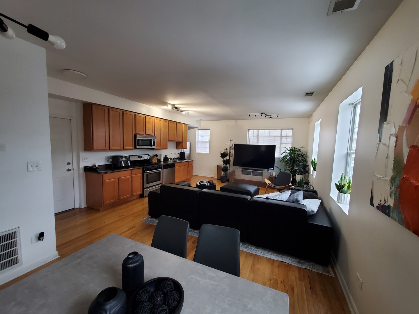 2014 West Superior Street, Unit 2 Chicago, IL 60612 - Photo 2 of 11 a living room with furniture and a flat screen tv