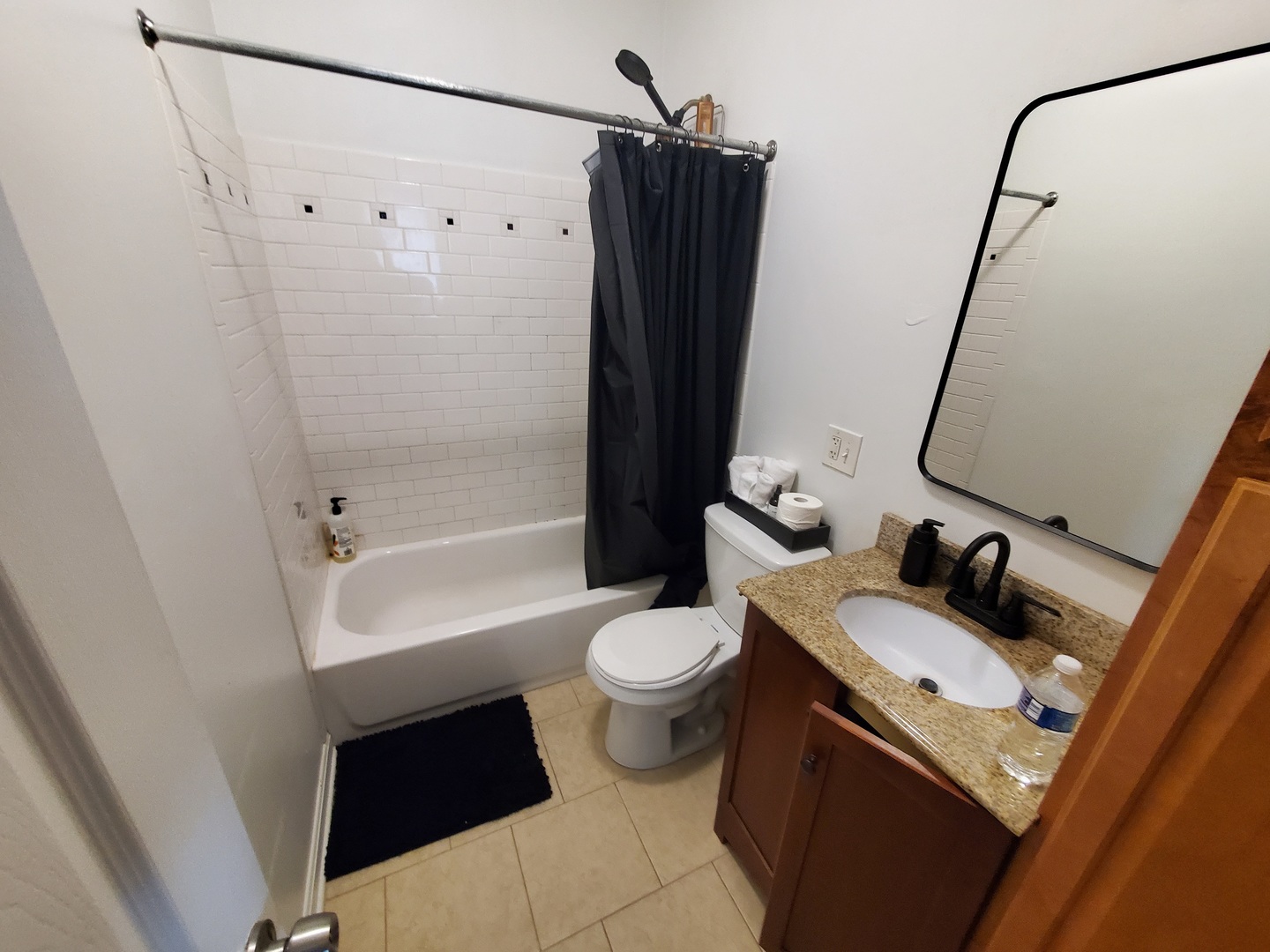 2014 West Superior Street, Unit 2 Chicago, IL 60612 - Photo 8 of 11 a bathroom with a sink a toilet and shower