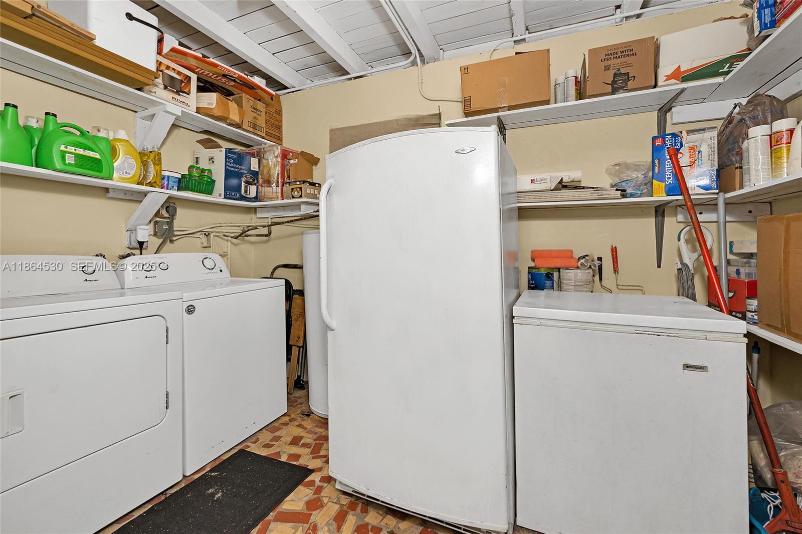 1220 Northwest 88th Street Miami, FL 33147 - Photo 25 of 31 a utility room with dryer and washer