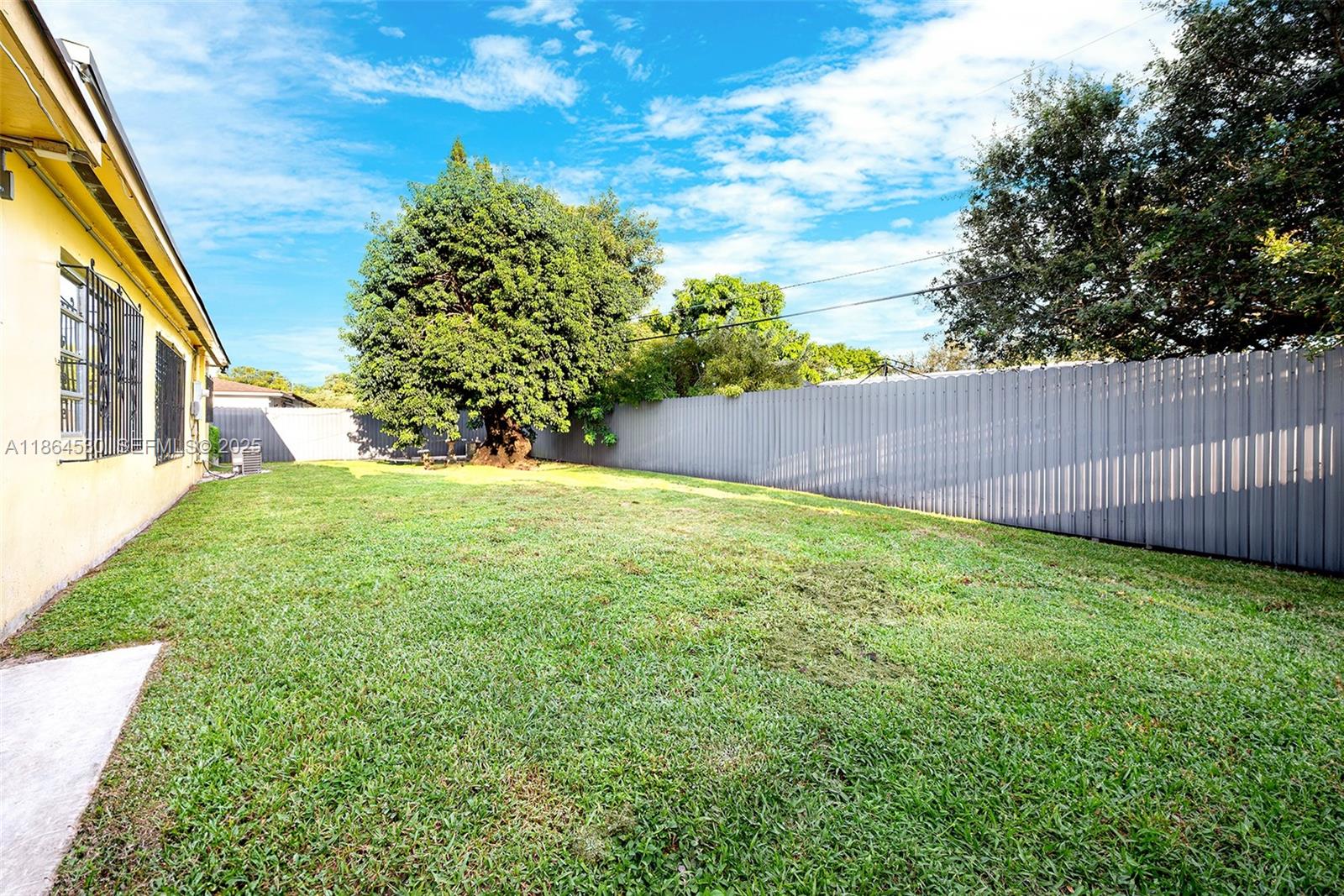 1220 Northwest 88th Street Miami, FL 33147 - Photo 26 of 31 a view of backyard with green space