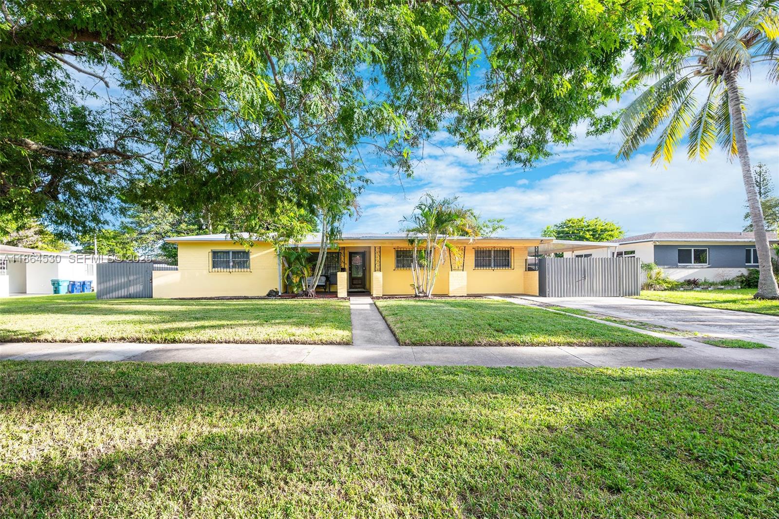 1220 Northwest 88th Street Miami, FL 33147 - Photo 4 of 31 a house view with a garden space