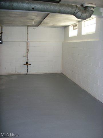 13202 Thraves Road Cleveland, OH 44125 - Photo 17 of 23 Freshly painted walls and epoxy resin on floor.