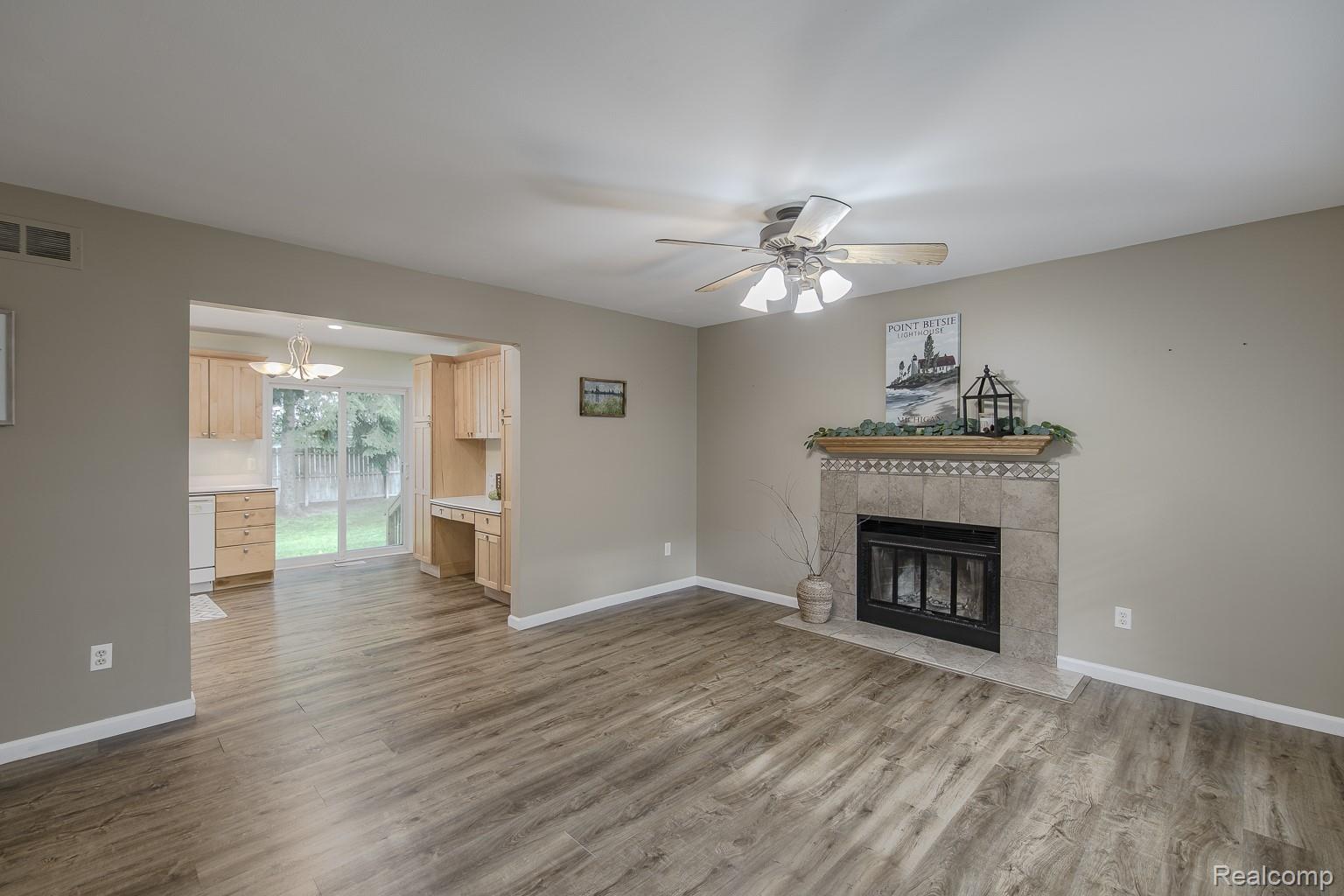 1665 Rosedale Street West Bloomfield, MI 48324 - Photo 5 of 41 Living room with wood burning fireplace
