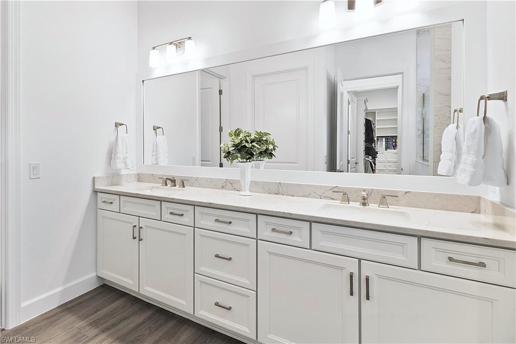20549 Napa Loop Estero, FL 33928 - Photo 25 of 50 a bathroom with a sink and a mirror
