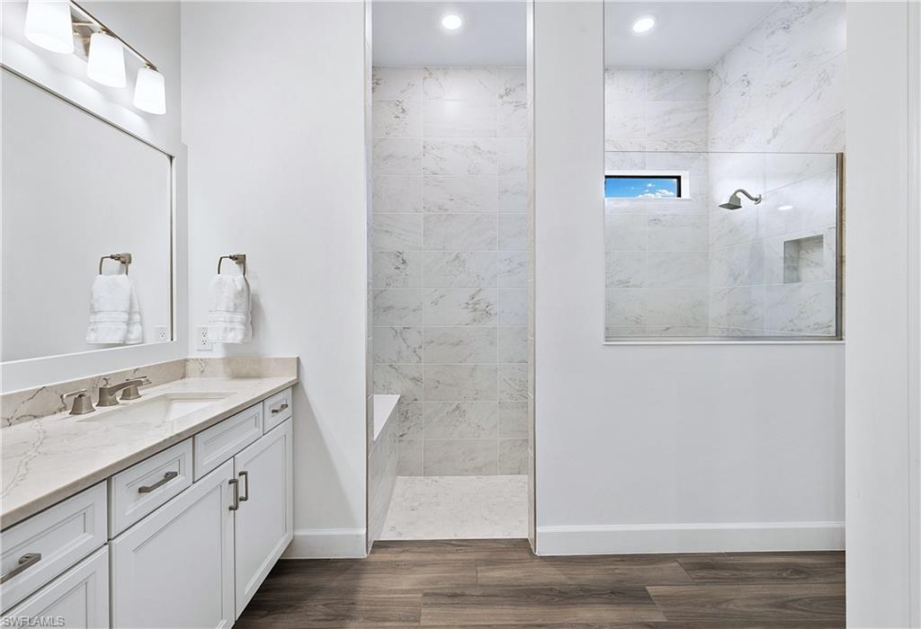 20549 Napa Loop Estero, FL 33928 - Photo 26 of 50 a bathroom with a sink and a mirror