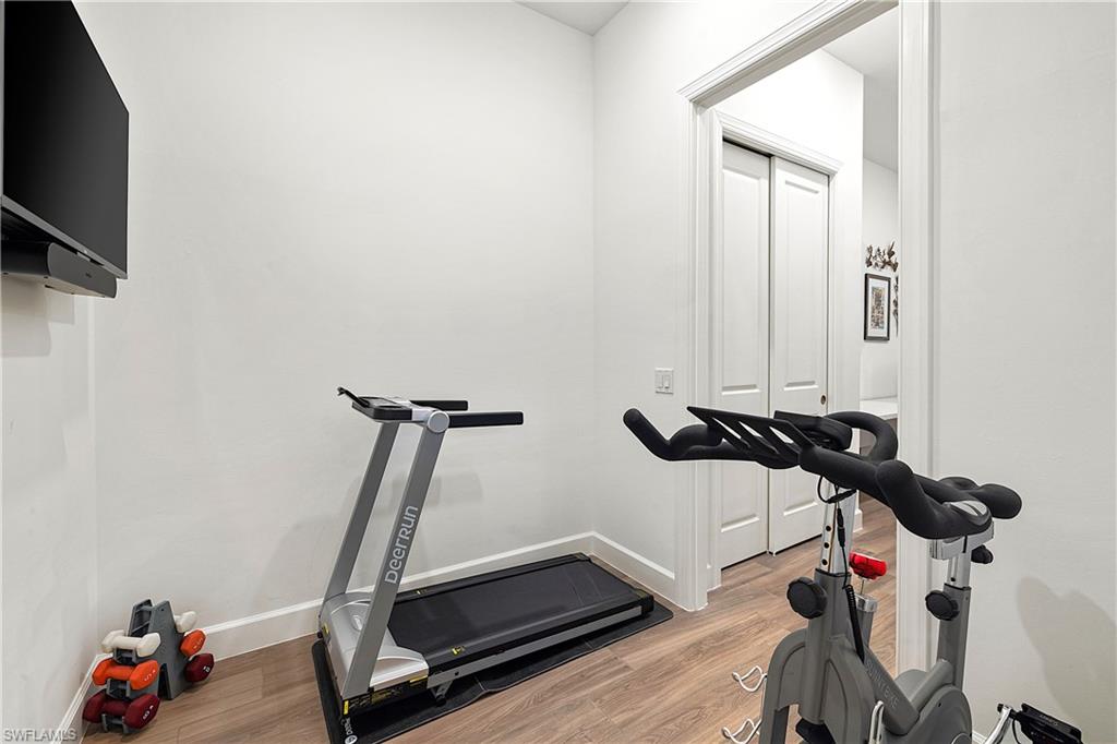 20549 Napa Loop Estero, FL 33928 - Photo 44 of 50 a view of a room with gym equipment
