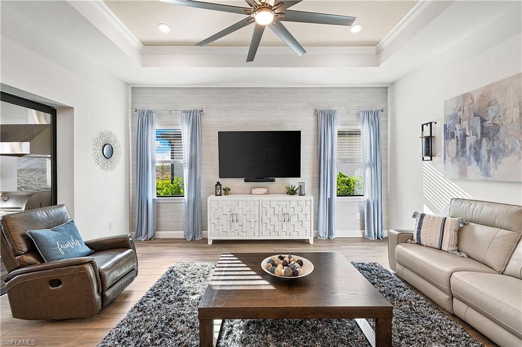20549 Napa Loop Estero, FL 33928 - Photo 6 of 50 a living room with furniture and a flat screen tv