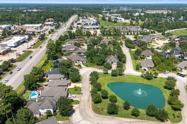 an aerial view of a city with lots of residential buildings
