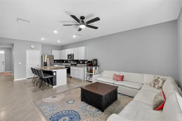 a room that has a dresser in it