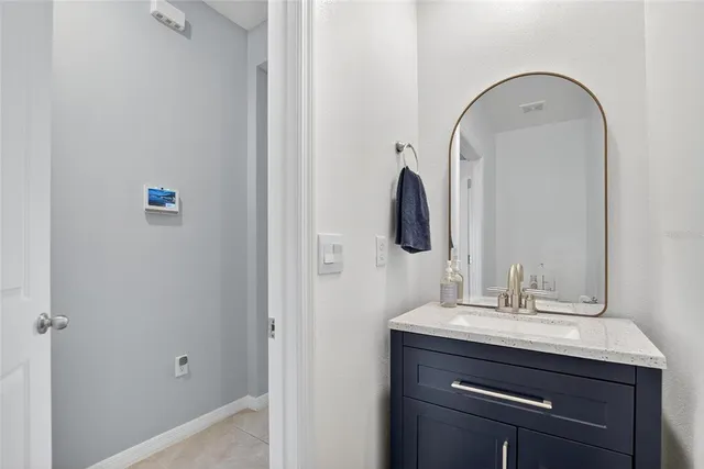 swimming pool view with a garden space