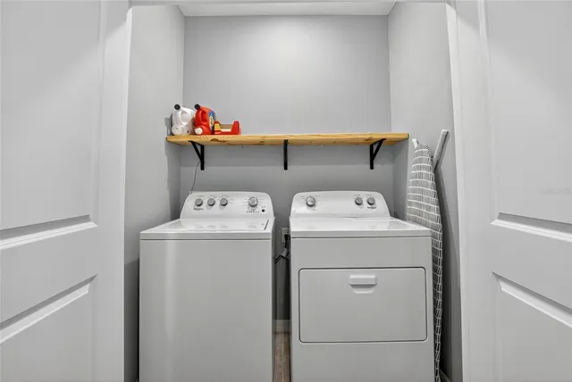 a view of room with window and entryway