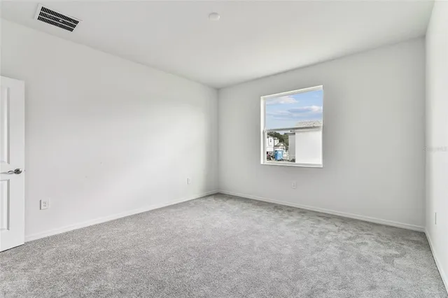 an empty room with a workbench