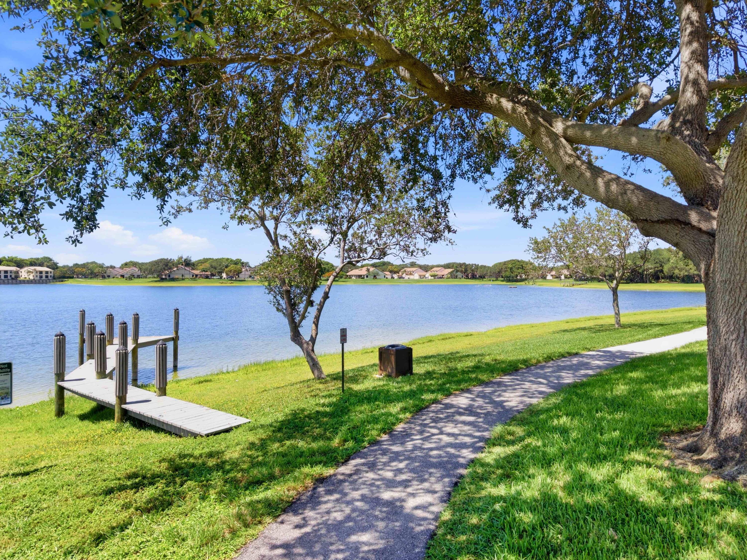 321 Norwood Terrace, Unit N221 Boca Raton, FL 33431 - Photo 31 of 36 Community Lake and trails