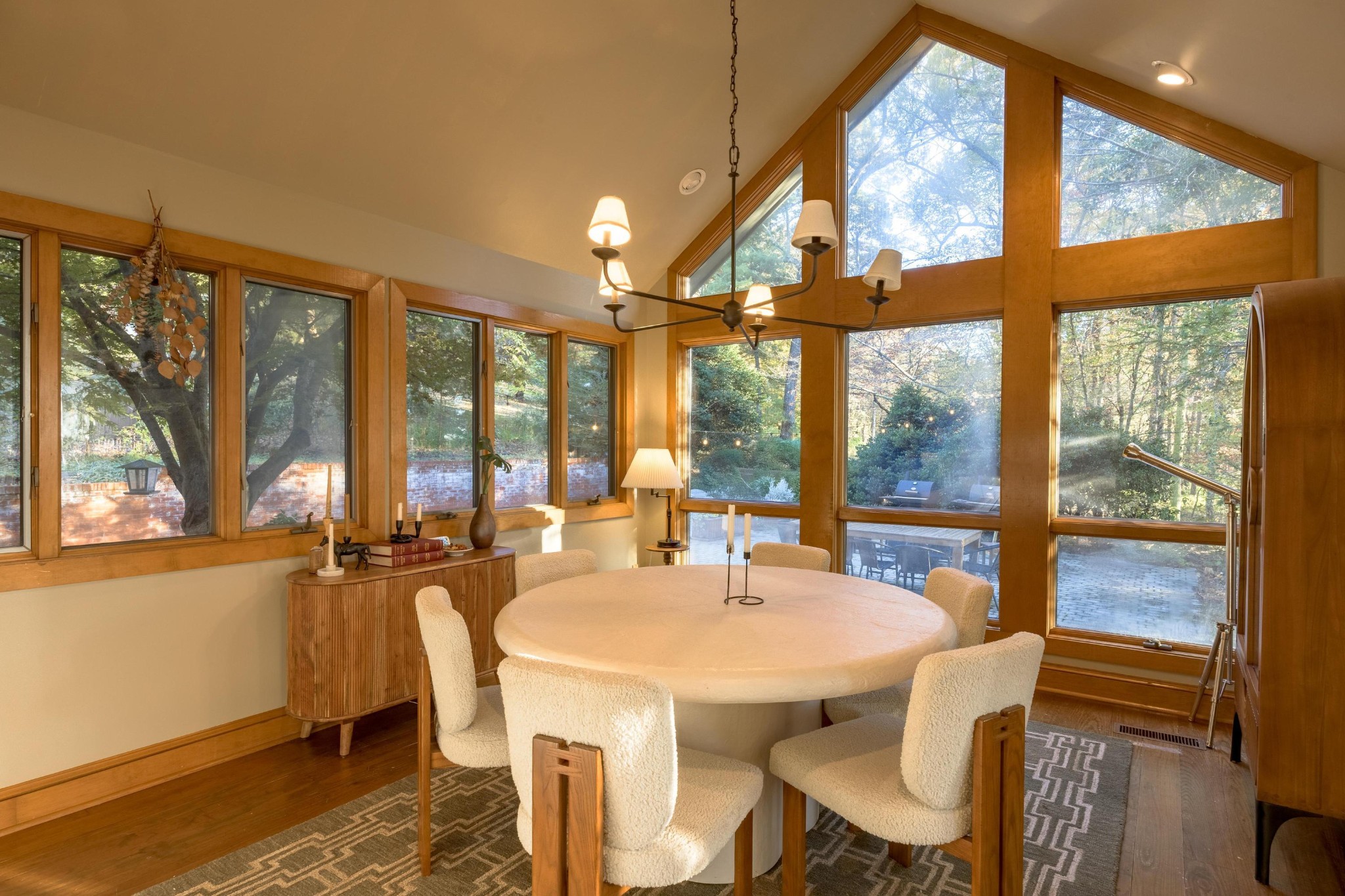 144 Parksville Road Benton, TN 37307 - Photo 22 of 64 a dining room with large windows and wooden floor