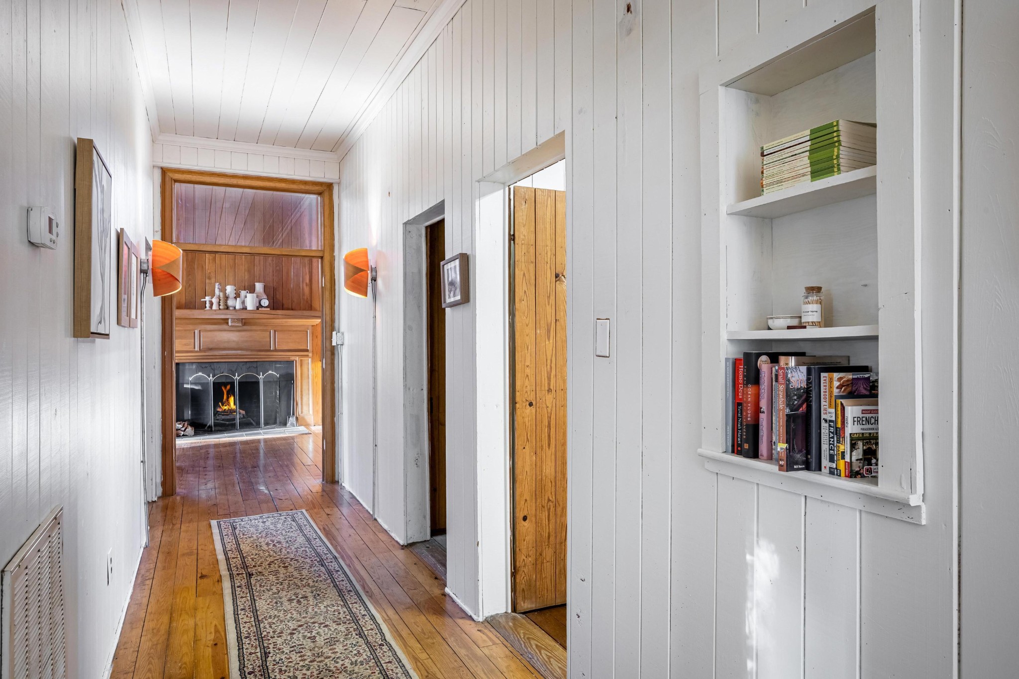144 Parksville Road Benton, TN 37307 - Photo 26 of 64 a view of a hallway with wooden floor and cabinet