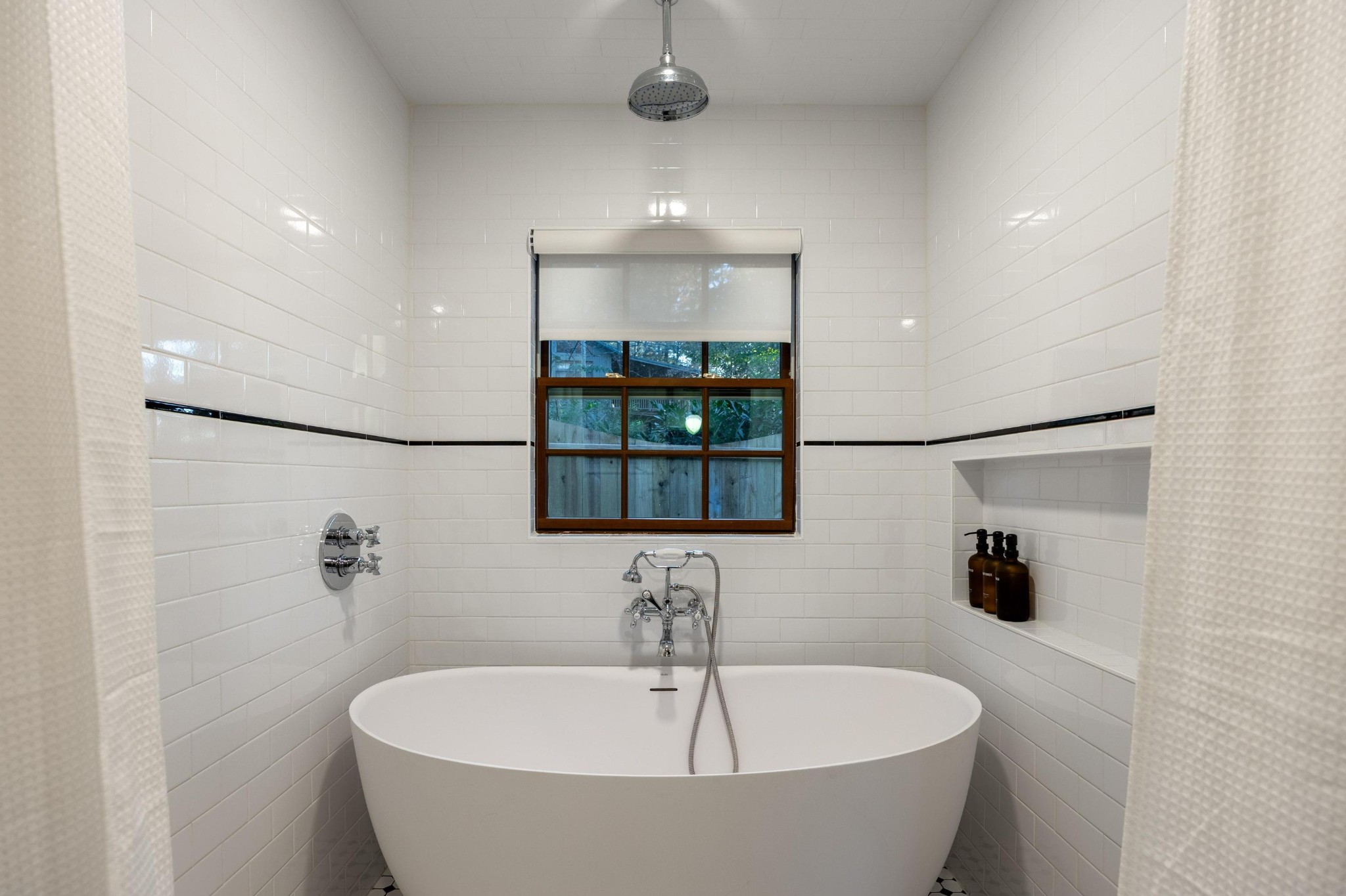 144 Parksville Road Benton, TN 37307 - Photo 40 of 64 a bathroom with a bathtub and shower