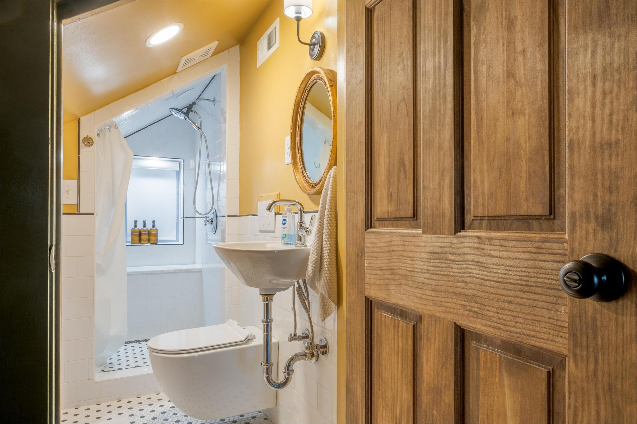 144 Parksville Road Benton, TN 37307 - Photo 47 of 64 a bathroom with a sink a toilet and a mirror