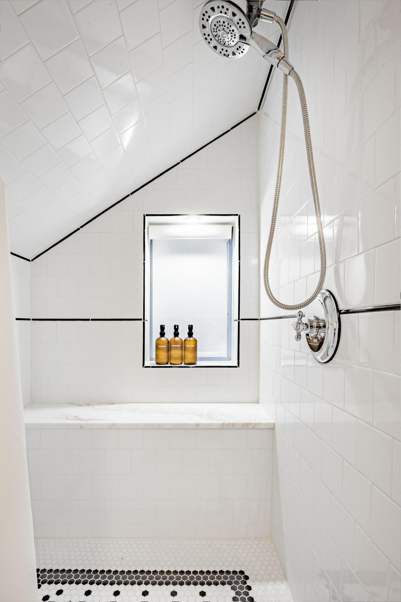 144 Parksville Road Benton, TN 37307 - Photo 48 of 64 a close view of light fixtures and a mirror of a bathroom