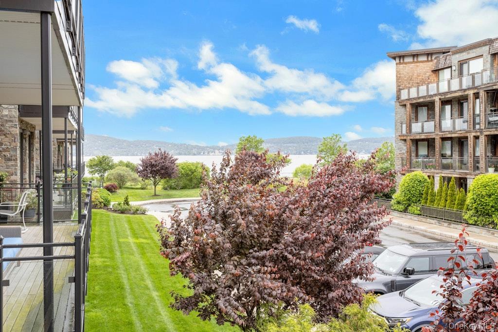 18 Rivers Edge Drive, Unit 211 Tarrytown, NY 10591 - Photo 2 of 30 a view of an outdoor space with a lake view