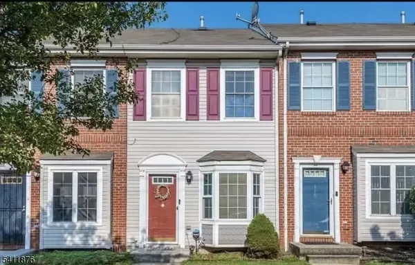 front view of brick house with a window