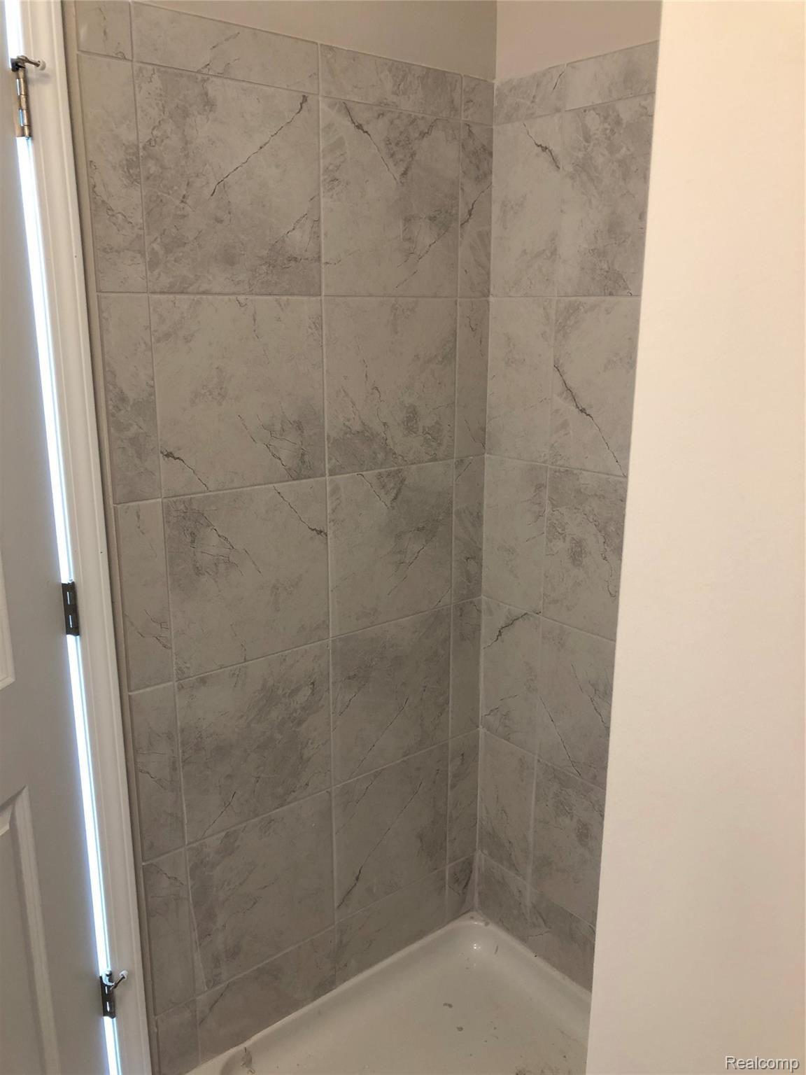 2500 Normandy Road, Unit 68 Royal Oak, MI 48073 - Photo 18 of 27 Tiled shower private master bath home site #68