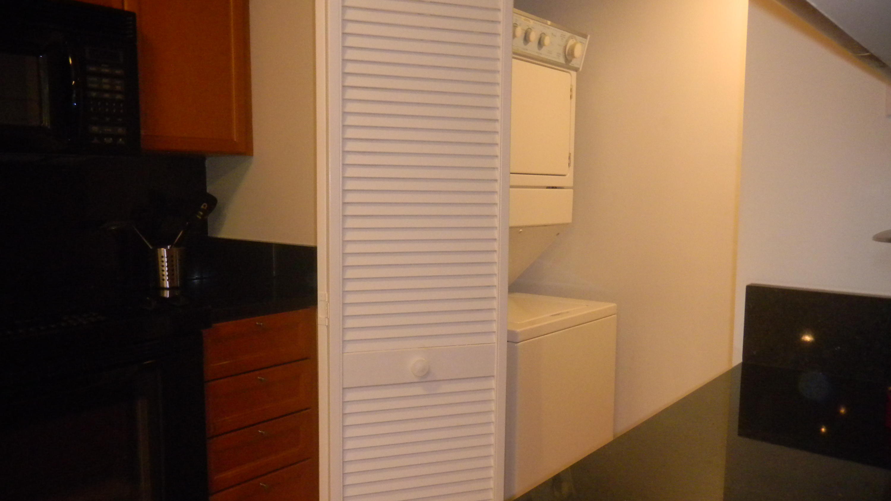 99 Southeast Mizner Boulevard, Unit 343 Boca Raton, FL 33432 - Photo 30 of 40 Utility Laundry Room