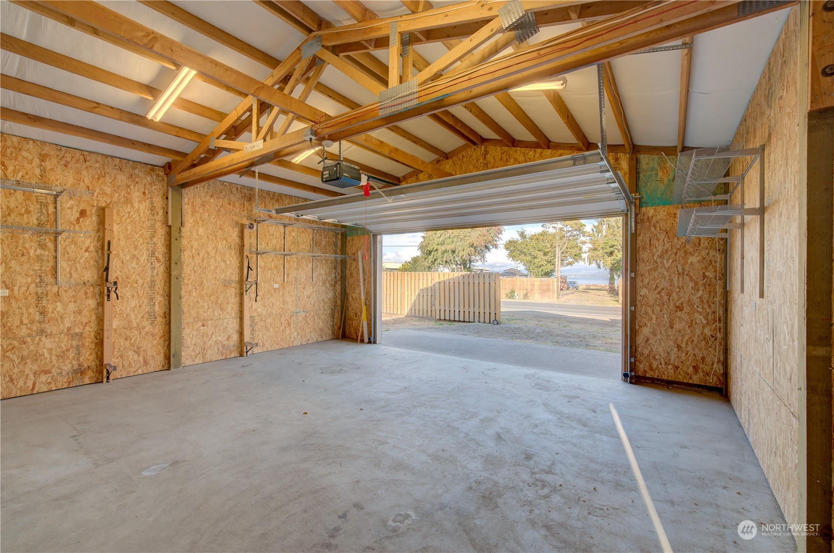 26507 Sandridge Road Nahcotta, WA 98640 - Photo 13 of 40 a view of an empty room with a sliding door
