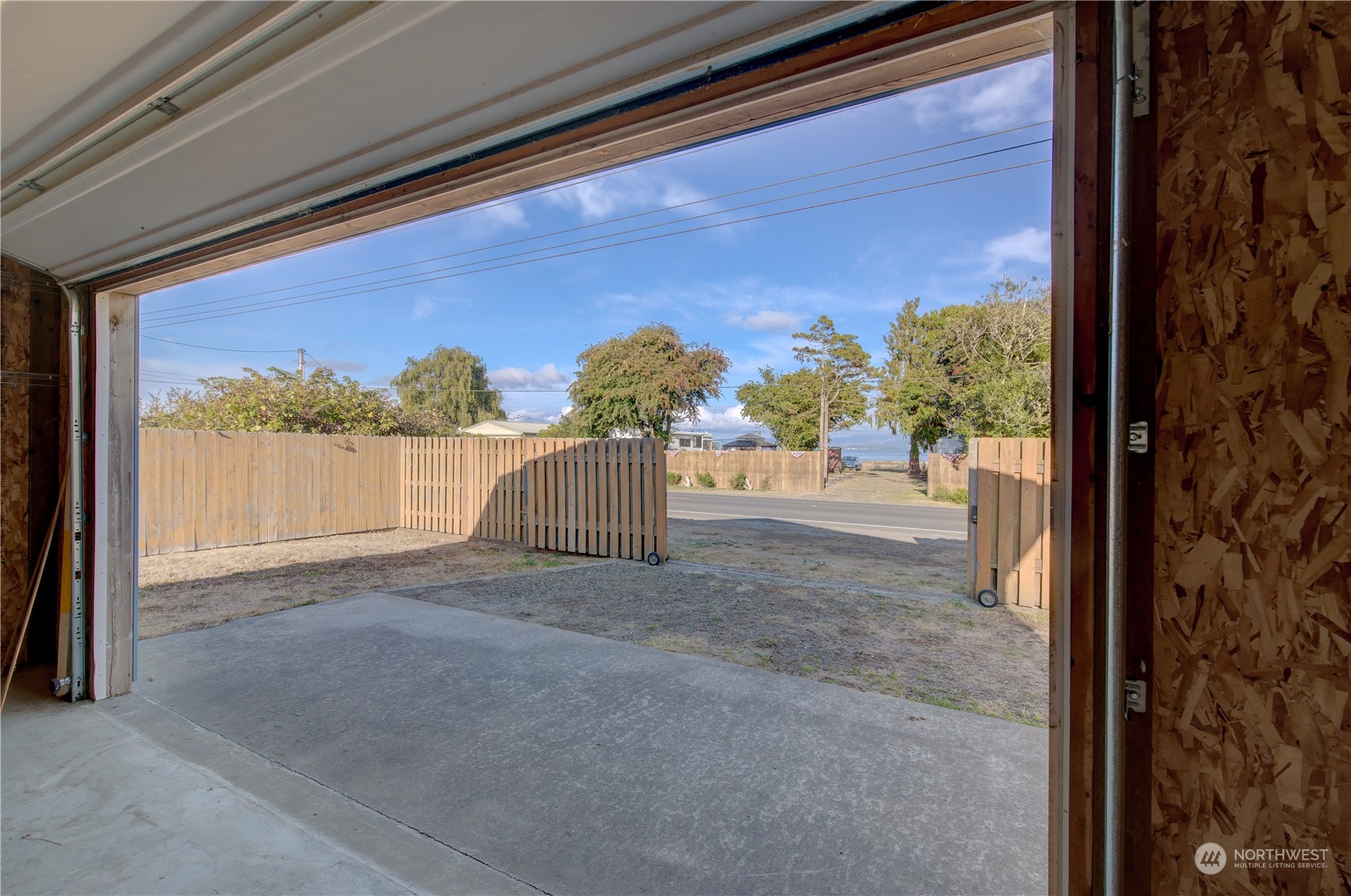 26507 Sandridge Road Nahcotta, WA 98640 - Photo 14 of 40 a view of a room with a floor to ceiling window and outside view